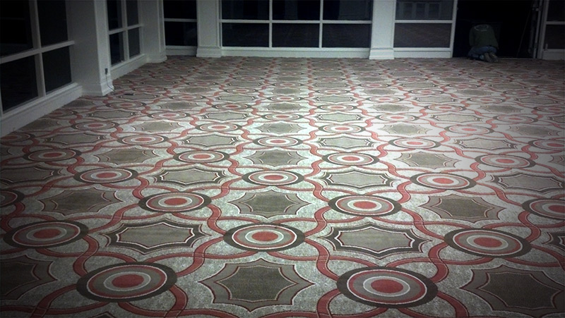 A floor with a pattern of circles and squares.